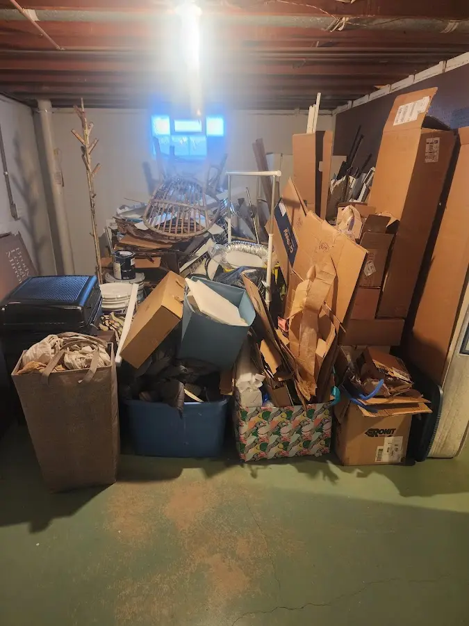 Roll-off dumpster container at job site for 15 Yard Dumpster Rental in Lake Norman of Iredell